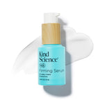 Kind Science Firming Serum bottle with a wooden cap with a swatch of the product