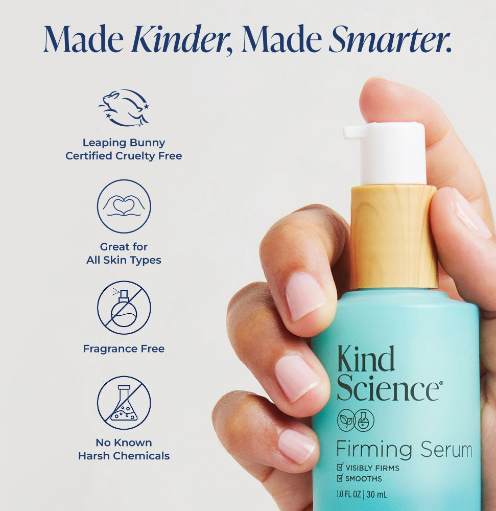 Hand holding a Kind Science firming serum bottle with product features listed on a white background.
