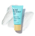 Kind Science Gentle Cleanser tube on a white background with a swatch of the product