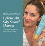 Woman with Gentle Cleanser product on her face who is holding a bottle of Kind Science Gentle Cleanser with product description text on a teal background