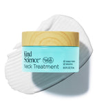 Kind Science Neck Treatment jar with wooden lid with a swatch of the product