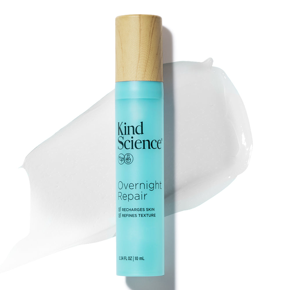 Kind Science Overnight Repair skincare product with a wooden cap with a swatch of the product