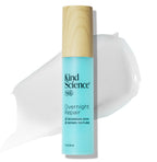 Kind Science Overnight Repair skincare product with a wooden cap on a white background with a swatch of the product
