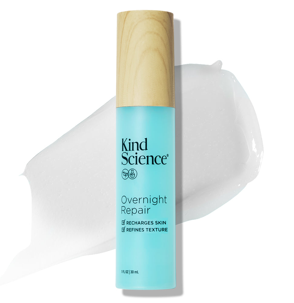 Kind Science Overnight Repair skincare product with a wooden cap on a white background with a swatch of the product