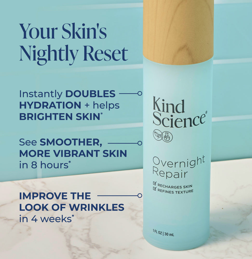 Kind Science Overnight Repair skincare bottle with product benefits text on a marble surface and blue gradient background