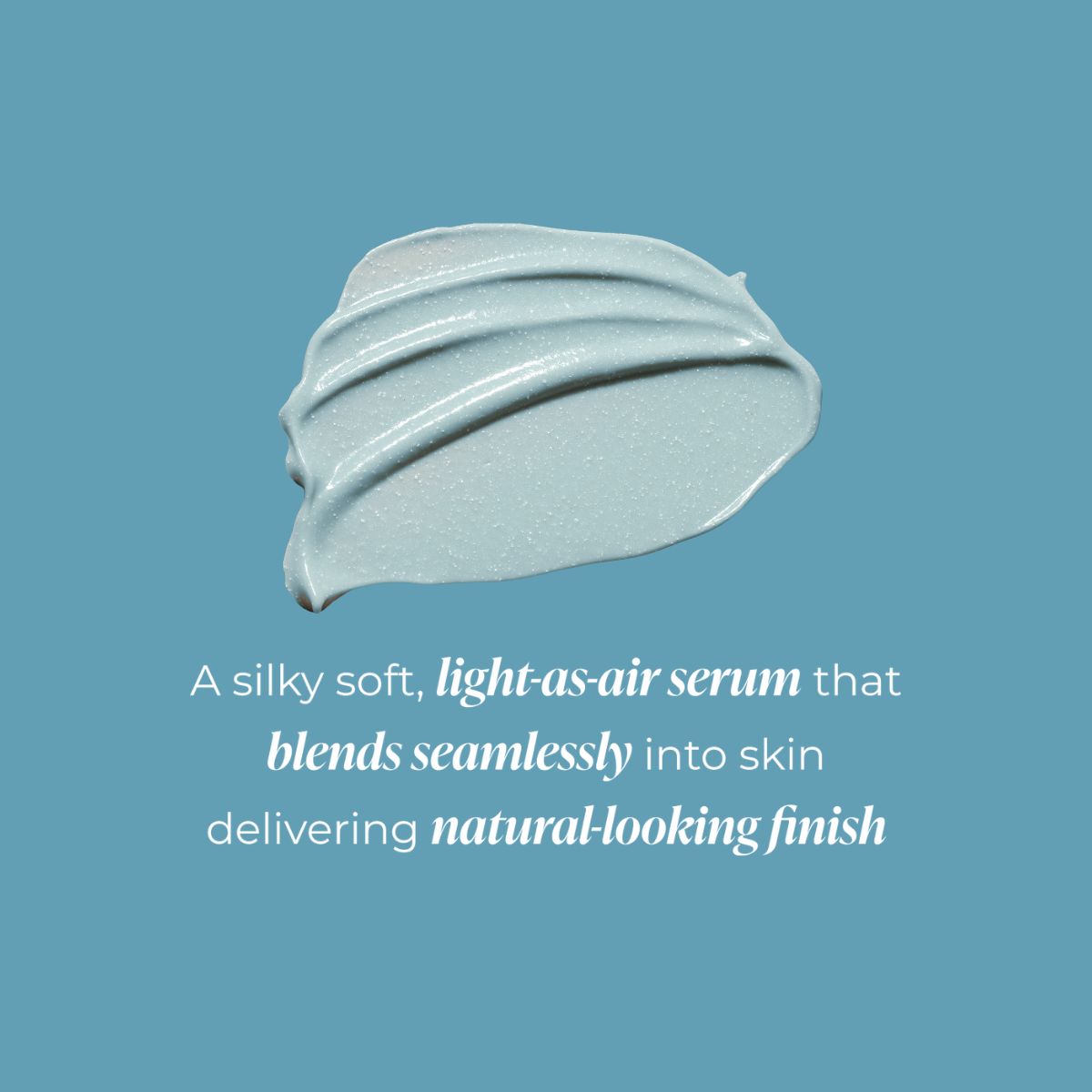 A swatch of light-as-air serum cream on a solid blue background, with descriptive text below highlighting its silky texture and seamless blending, reading 'a sily soft, light-as-air serum that blends into skin naturally'
