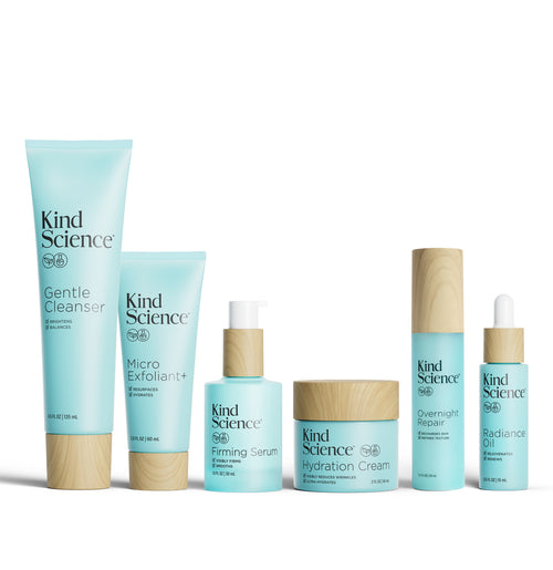 Collection of Kind Science skincare products on a white background