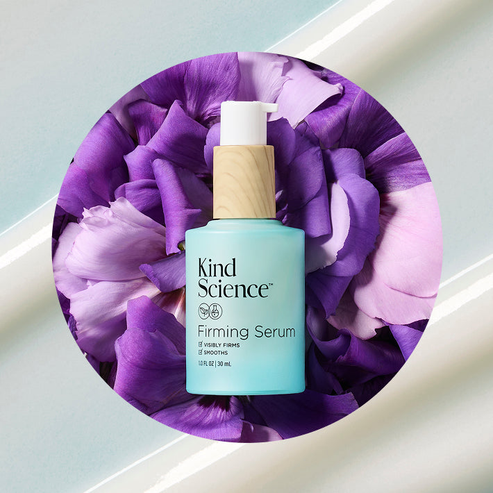 Kind Science Firming Serum bottle on a purple floral background, depicting Bakuchiol Aka "Nature's Retinol"
