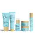 Collection of Kind Science skincare products on a white background